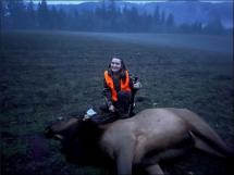Youth hunter with an elk harvested on a Damage Pool hunt. 