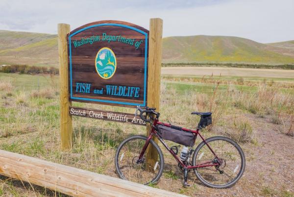 Bike next to WDFW wildlife area sign