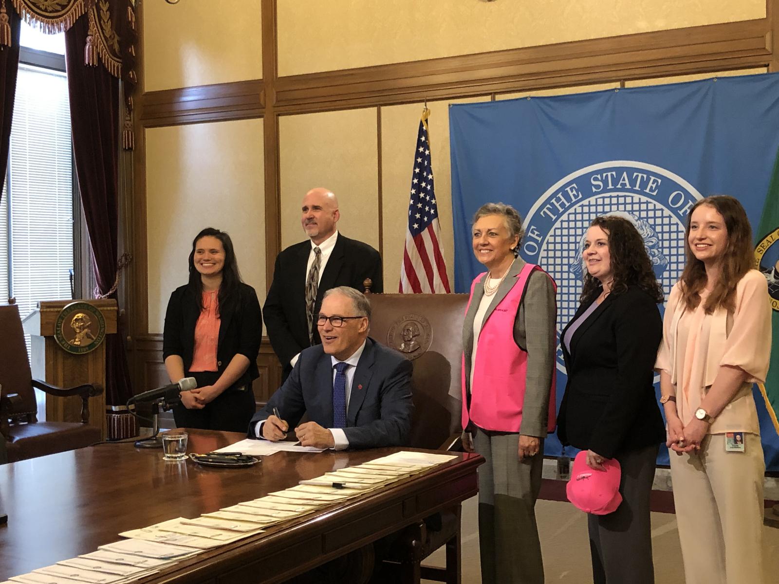 Hunter pink bill signed by Governor Jay Inslee