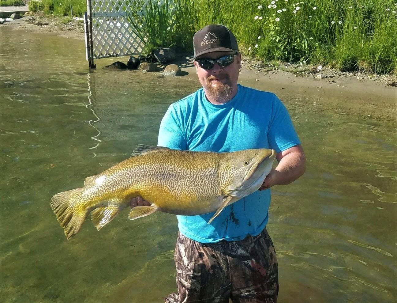 Caylun Peterson with record tiger trout