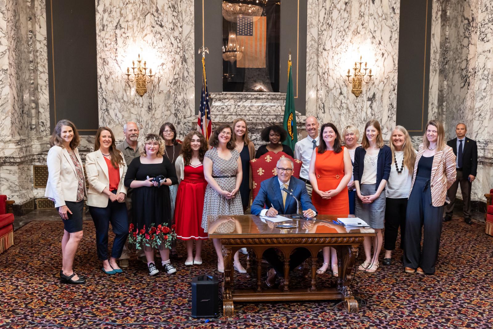 WDFW staff and others with Governor at signing of Senate Bill 5371