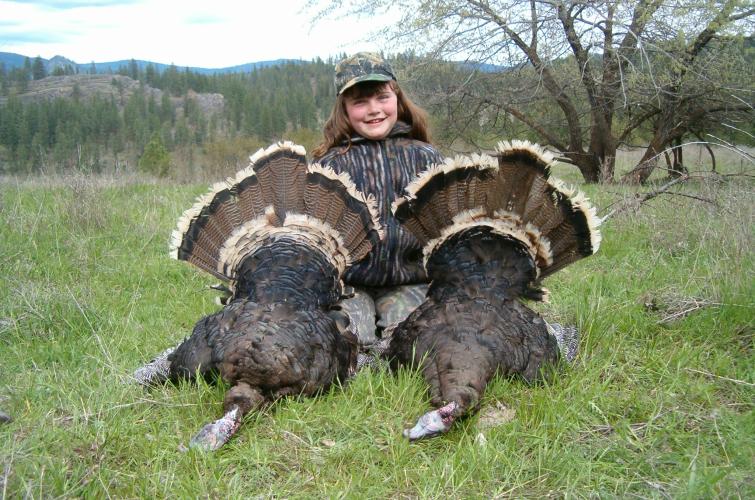 Girl with two turkeys