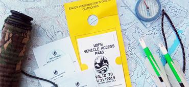 Fishing and hunting licenses, vehicle access pass, and maps.