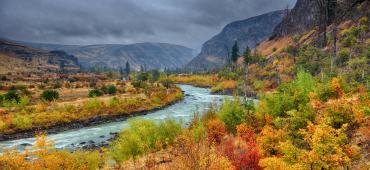 Scenic fall view of a river meandering through a valley