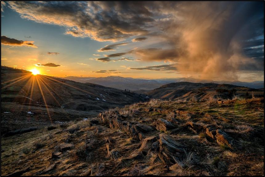 Early spring snow shower at sunset near Tonasket.