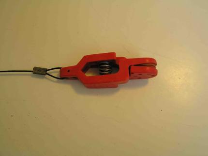 Red spring loaded line release for use with a downrigger