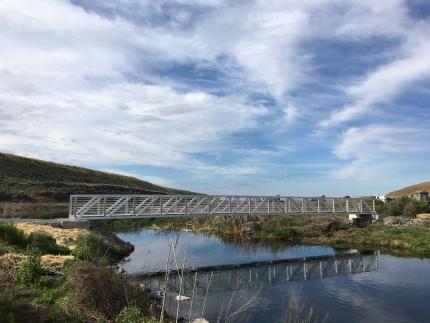 A bridge spans Rocky Ford Creek at the Columbia Basin Wildlife Area