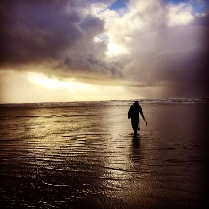 Beautiful image of razor clamming at sunset