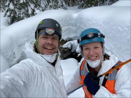 Biologists Holman and Wickhem suited for bat hibernacula survey.