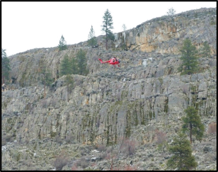 Helicopter flying by Mount Hull