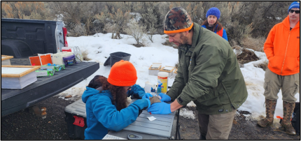 Gallie and Soltysiak examine a pygmy rabbit