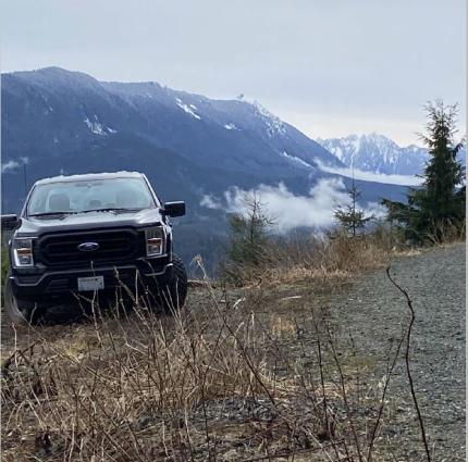 Biologist Licence at a scenic grouse listening stop near Granite Falls.