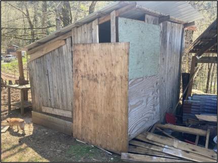 Chicken coop ripped apart by a bear.