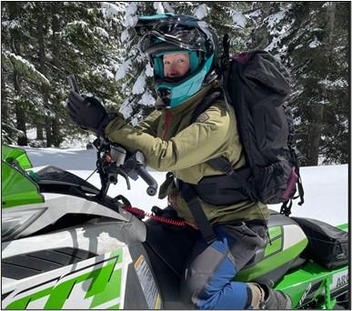 Biologist Stephens setting sooty grouse survey locations in the snowy Cascade Mountains on U.S. Forest Service lands.