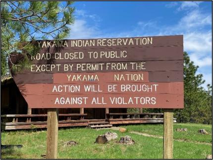 A Yakama Indian Reservation sign.