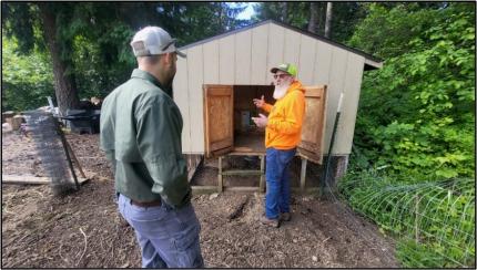 Jacobsen speaking to the landowner.