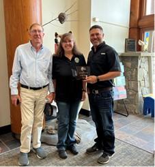 Biologist Hadley with Dennis Rea and Nathan Rea, Landowner of the Year