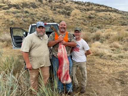 Master Hunter with a cow elk