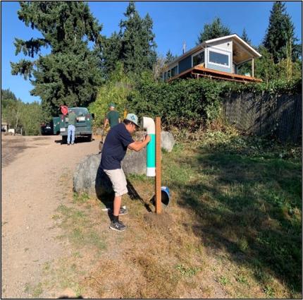 Long Lake recycling tube install. 