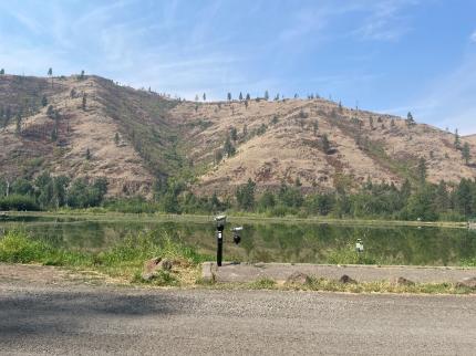 A spotting scope at Rainbow Lake