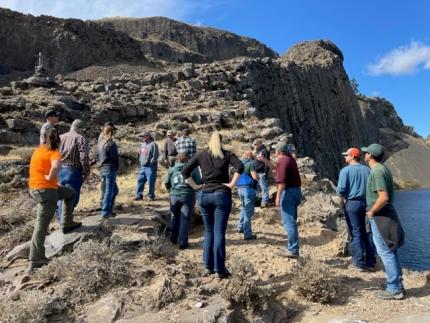 WDFW staff members viewing a memorial