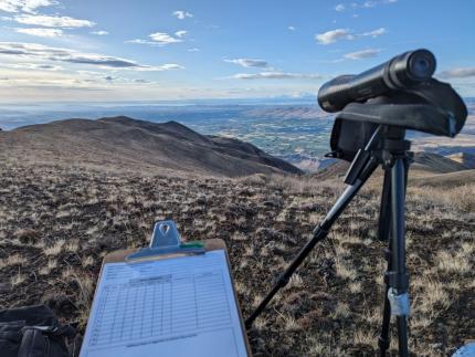 A clipboard and scope for surveying