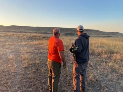 Two Pheasants Forever members scouting a location