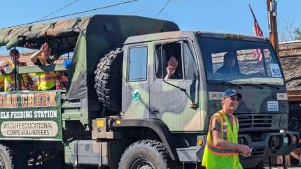 A truck with a person in front