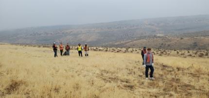 Naches Valley High School seniors collect garbage off the Cowiche Unit feeding site.