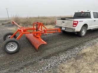 The new rock rake for entry road.