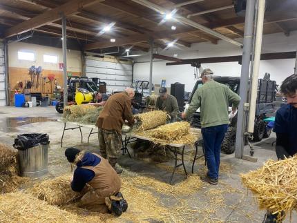 The work group for mallard nest tube construction.