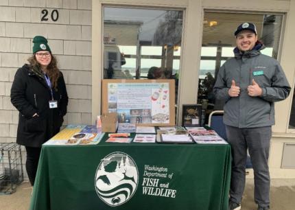 WDFW staff at outreach booth at Penn Cove Musselfest