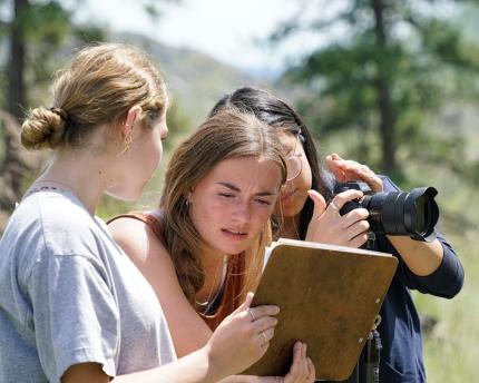 Okanogan High School students taking post-wildfire photo monitoring pic. 