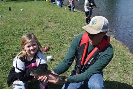 Technician assisting at The Boy’s & Girl’s Club Kid’s Fishing Event in Dayton.  