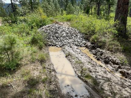 Rock pile before spreading.