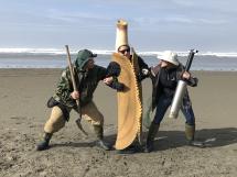 #Teamshovel or #TeamClamGun -- battling it out over a razor clam (razor clam mascot)
