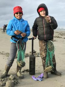 Clam diggers on a coastal Washington beach