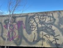 Before photo of graffiti removal on structure at the Oak Creek Wildlife Area.