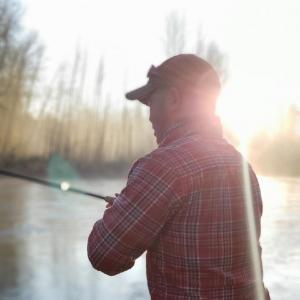 Angler fishing for winter steelhead
